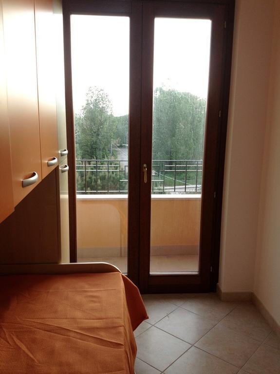 Regina Apartments Алгеро Стая снимка