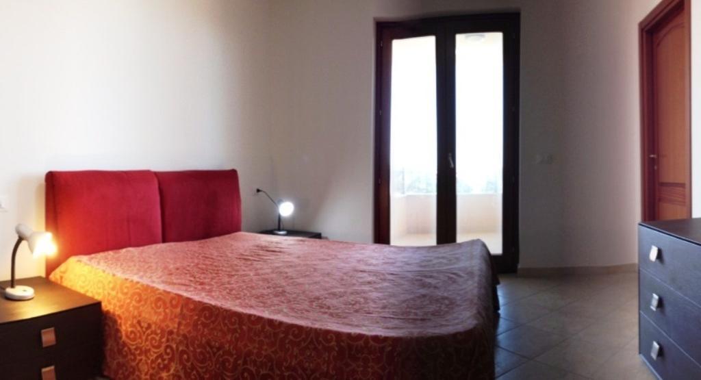 Regina Apartments Алгеро Стая снимка
