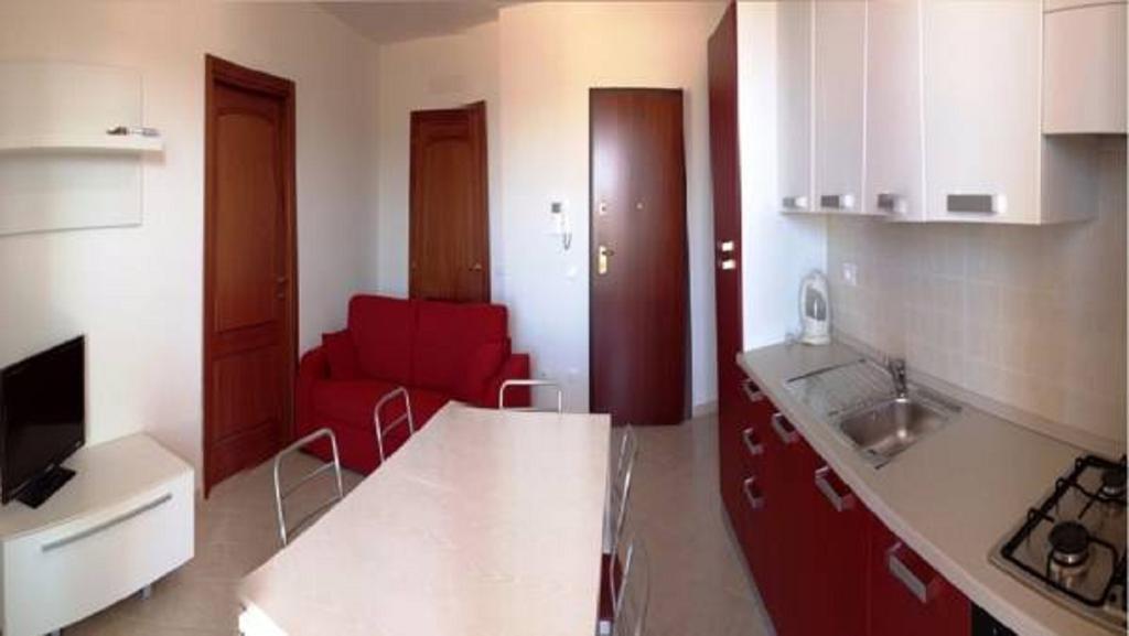 Regina Apartments Алгеро Стая снимка